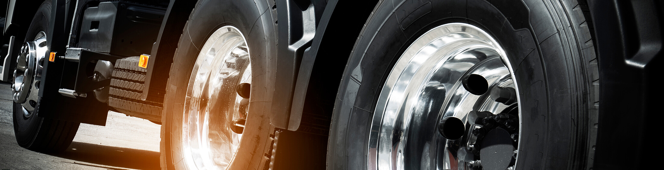 Close up of oversized tires on a semi tractor